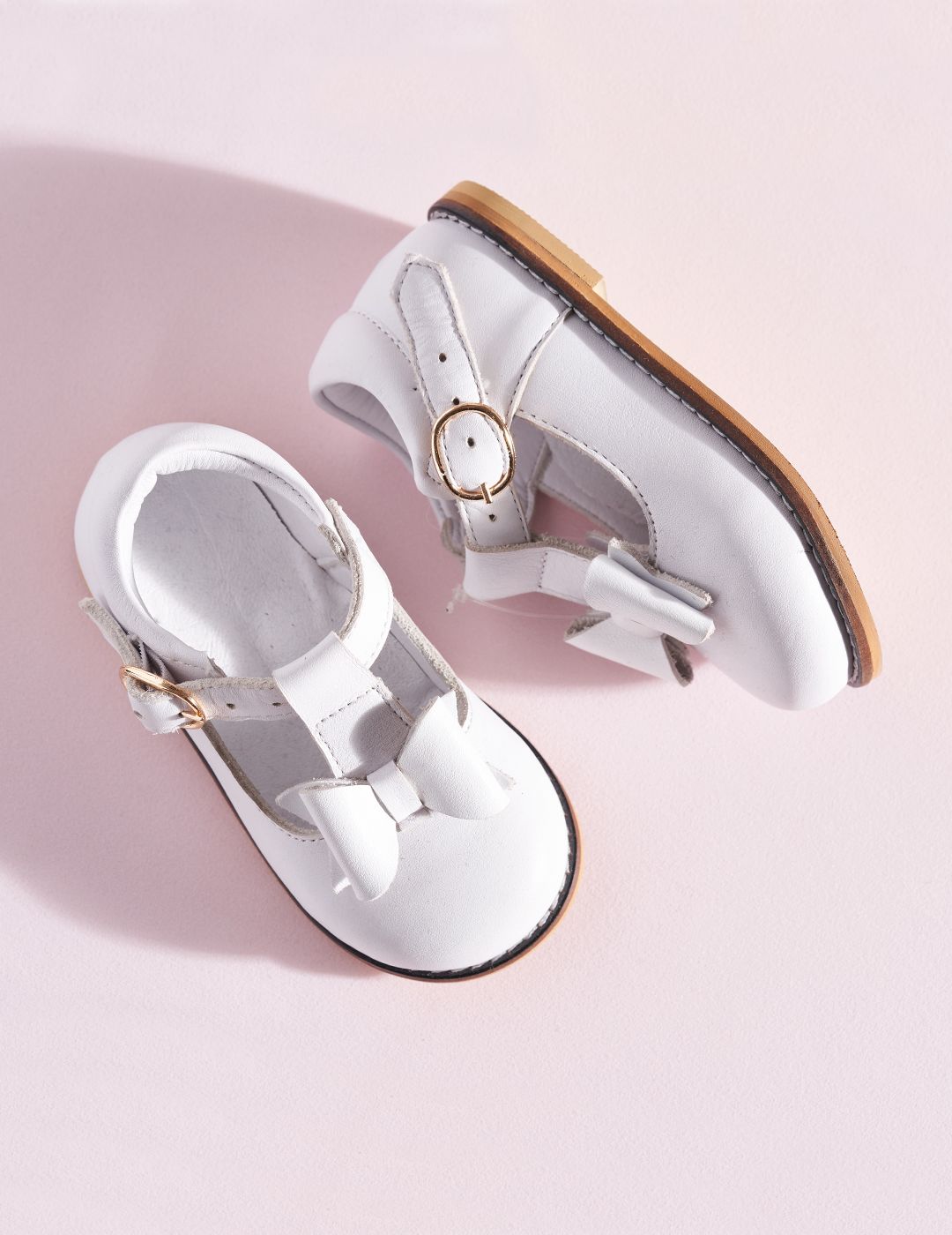 Center Bow White First Steps Shoes