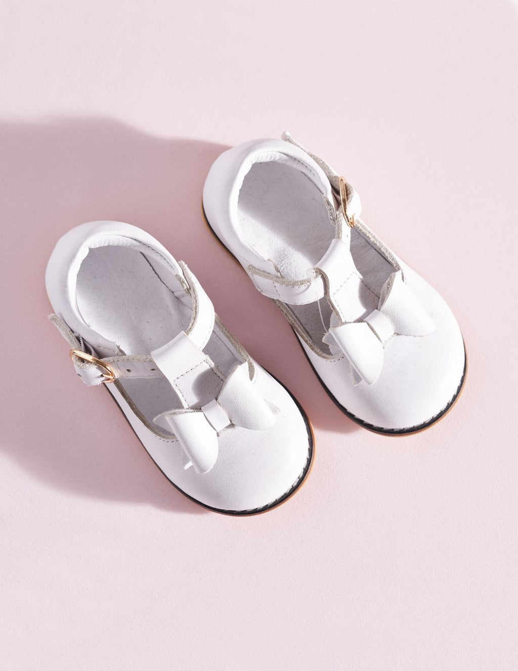Center Bow White First Steps Shoes