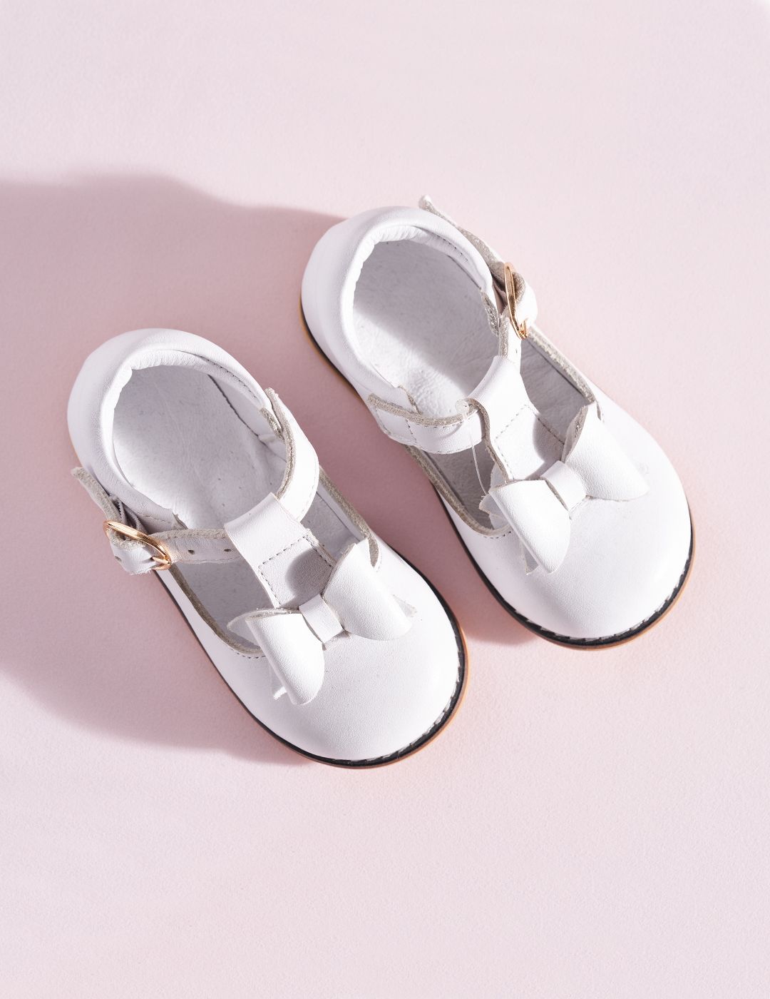 Center Bow White First Steps Shoes